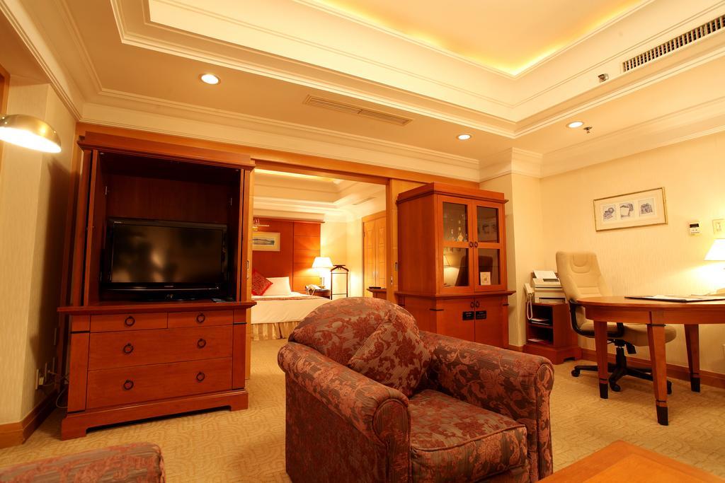 Ruishi Hotel Далянь Номер фото