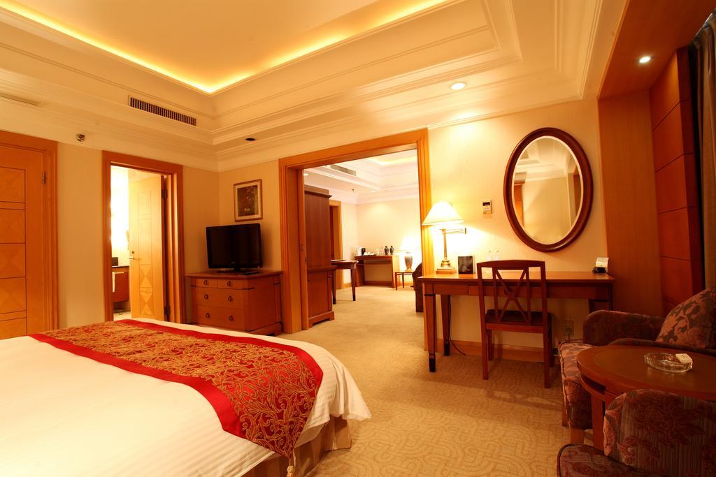 Ruishi Hotel Далянь Номер фото